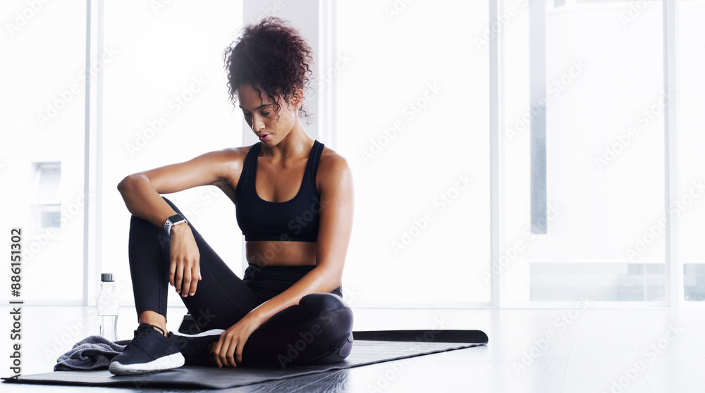 Poster Woman, fitness and tired of workout with break in gym for exercise, physical activity or overworked on floor. Athlete, person and rest on mat to relax, recovery or exhausted from training for health