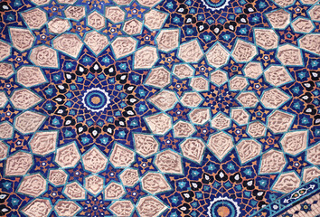 Vertical or horizontal background with detail of ancient mosaic walls with floral and geometric ornaments. Traditional iranian tile decorations