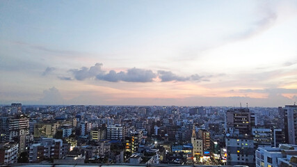Fototapeta premium Amazing view of a cityscape with blue sunset Sky