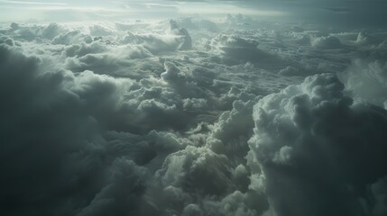 Obraz premium Depict an aerial perspective of nimbostratus clouds, heavy with rain and covering the landscape in a blanket of gray