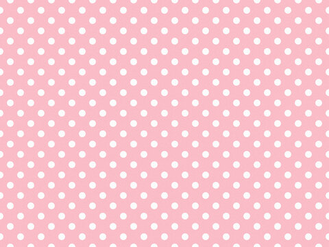 texturised white color polka dots over pink background