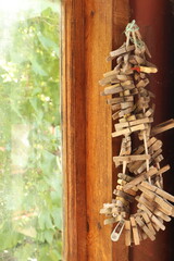 collection of wooden clothespins put together