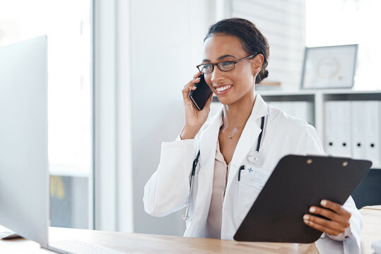 Woman, doctor and phone call with computer in clinic for medical results, appointment schedule or virtual advice. Medicine, clipboard or telehealth with online consultation, checkup and happy to help