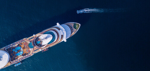Fototapeta premium Aerial view beautiful luxury cruise ship on the ocean sea, Luxury cruise liner exclusive tourism travel by cruise ship, Cruise ship travel on holiday take vacation time international.