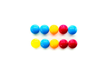 equal sign. Math Symbol multicolored rainbow candies isolated on white background. alphabet and numbers