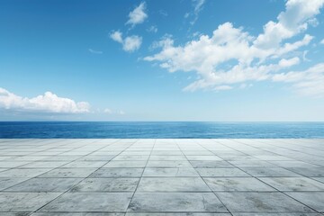 Blue sky with empty concrete floor and sea view. Vibrant banner with space for copy. Horizontal image of a calm ocean and clear sky. Ideal for promotional use
