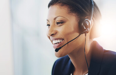 Woman, happy and call centre in office with headsets, talking and outbound calls with company representative. Virtual conversation, help desk and customer service consultant, business and support