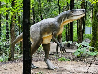 Wawel Dragon. Dragon from Lisowice.Archozaur dinosaur. Realistic figure of an Archozaur dinosaur inforest park in Kazimierz Sosnowiec. Prehistoric predator fascinating element of the landscape. © Chawran