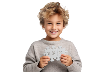 A Young Boy's Triumphant Puzzle Completion on a White or Clear Surface PNG Transparent Background.