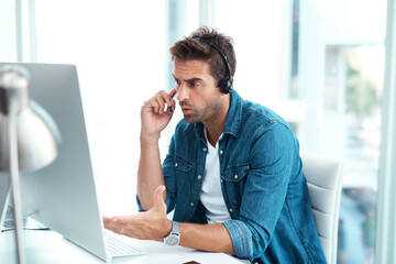 Consultation, headset and man in office, asking and confused for helping in agency or customer service. Advisor, unhappy or call center with mic, communication and upset for telemarketing or operator