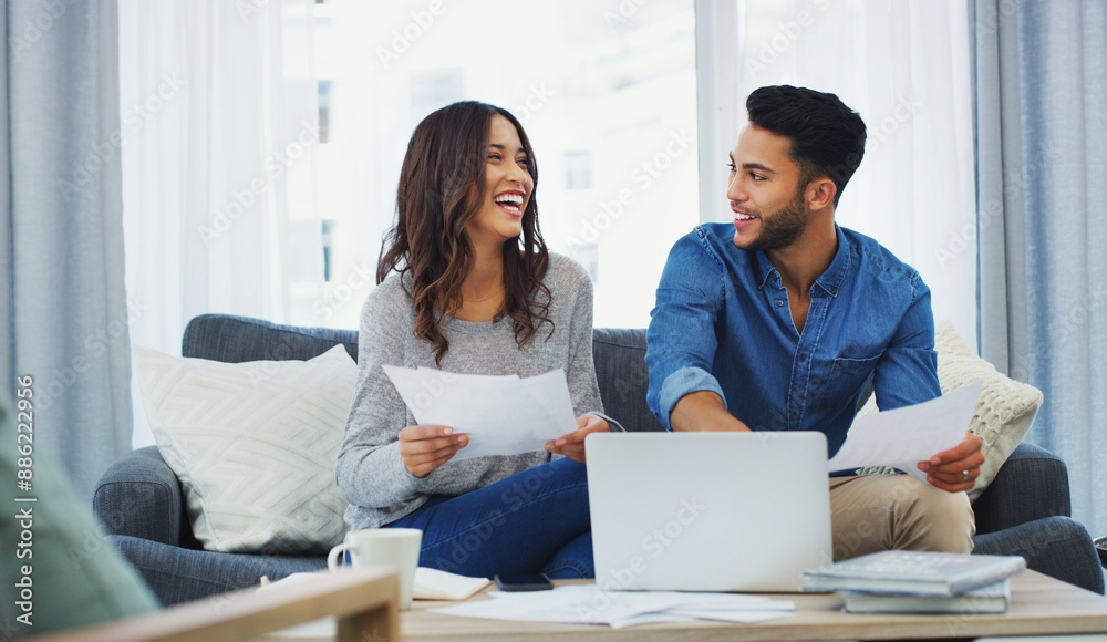 Sticker Documents, funny and laptop with couple on sofa in living room of home for bank payment. Computer, finance or laughing with man and woman in apartment to review insurance, mortgage or tax paperwork