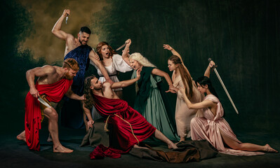 People, men and women, in classical attire enact dramatic scene of conflict. Reminiscent of ancient...