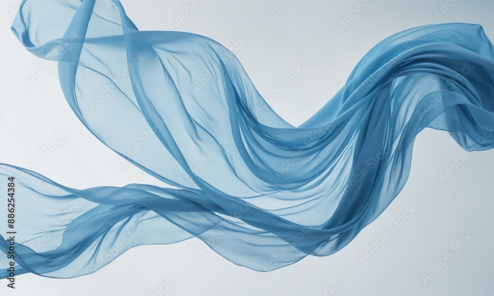 Wall mural Blue chiffon fabric flowing in the air