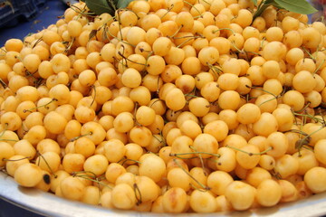 Fresh juicy yellow cherry at Farmer's Market 