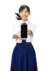 A girl in a school uniform holding a cell phone