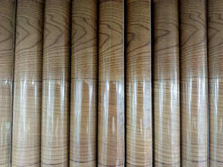 A Roll Of Some Brownish Cardboard Wrapped In Clear Plastic