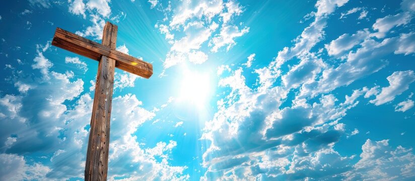 Wooden Cross Against Bright Sky . Wide version