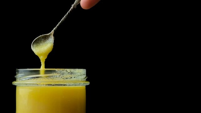 Natural ghee healthy oil, black background