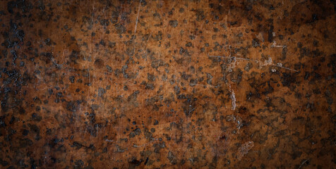 Old leather background. Fragment of a leather cover of an old book from the 18th century. Retro background on the theme of vintage, history, antiques.