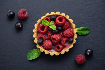 raspberry tart, Tartlet with fresh raspberries, top view. Delicious dessert