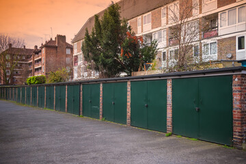 Council garages at Rockingham estate in London during sunset