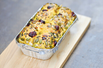 bread or bun with raisin stuffed or raisin bun