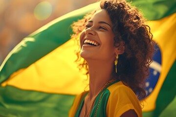 Happy young girl football fan celebrating her team victory. Latino woman with Brazil flag laughing and smiling. Celebration of Independence Day, Labor Day, Proclamation of the Republic