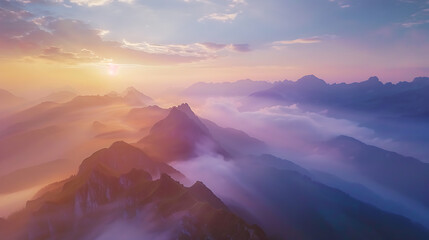 Drone Photograph of Mountain Range at Sunrise with Clouds