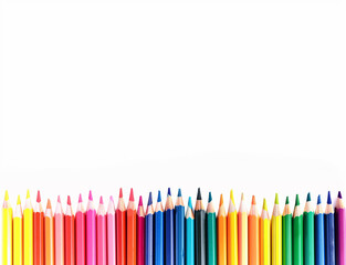 A row of colourful rainbow pencils on a white background