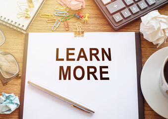Learn More Business and Financial Concept On A Desk