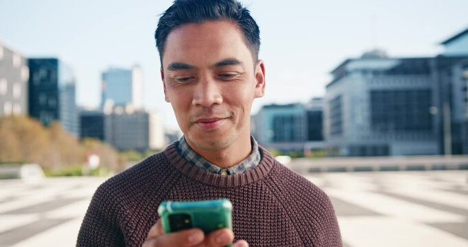 Portrait Of Young Urban Professional Smiling At Phone