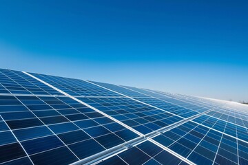 A wide-angle view of a solar panel installation on a rooftop, taken from a high angle, showcasing the panels and a clear blue sky