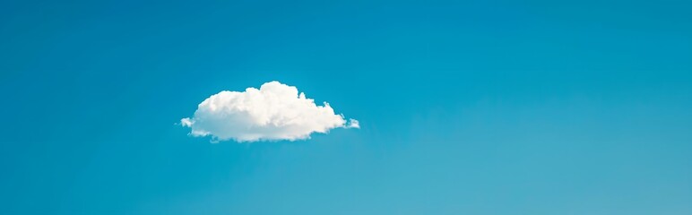 Single Cloud in a Blue Sky Minimalist Background
