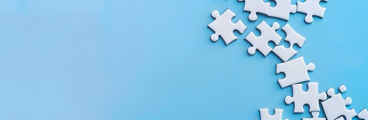 Obraz premium White Puzzle Pieces on Blue Background Unity Concept