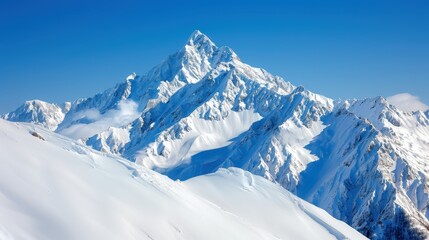 Sunlit snow-covered mountain range dominated by a clear blue sky with multiple layered peaks, portraying timeless beauty, adventure, and excellence in a modern photographic style.