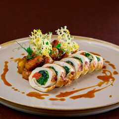 tasty chicken sushi with potatoes on white plate