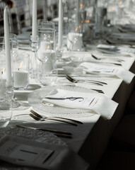 wedding white posh and luxury table setting decorations with guests seat