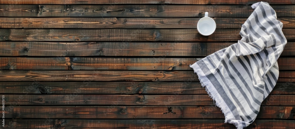 Aufkleber Top view mockup of an empty wooden deck table with a napkin covered tablecloth and copy space image