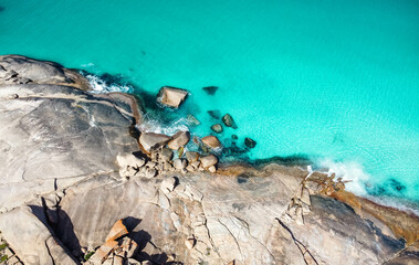 Rocks on water in Australia with drone