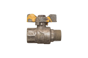 Old, metal ball valve with a yellow lever, isolated. The valve is worn and rusted.