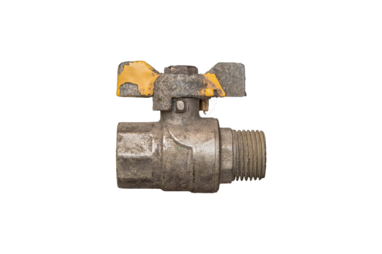 Old, metal ball valve with a yellow lever, isolated. The valve is worn and rusted.