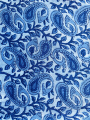Intricate paisley mughal block printed design on blue cotton fabric