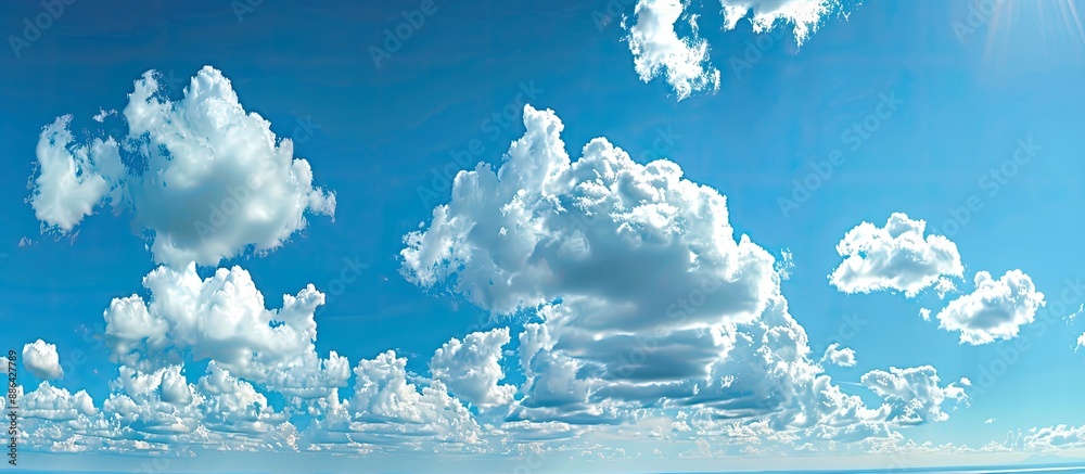Poster A panoramic view of a vast blue sky with billowing clouds ideal for copy space image