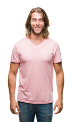 Obraz premium Young handsome man with long hair over isolated background with a happy and cool smile on face. Lucky person.