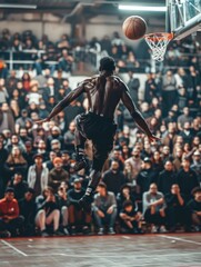 Fototapeta premium A person attempting to dunk a basketball, with focus on the movement and action