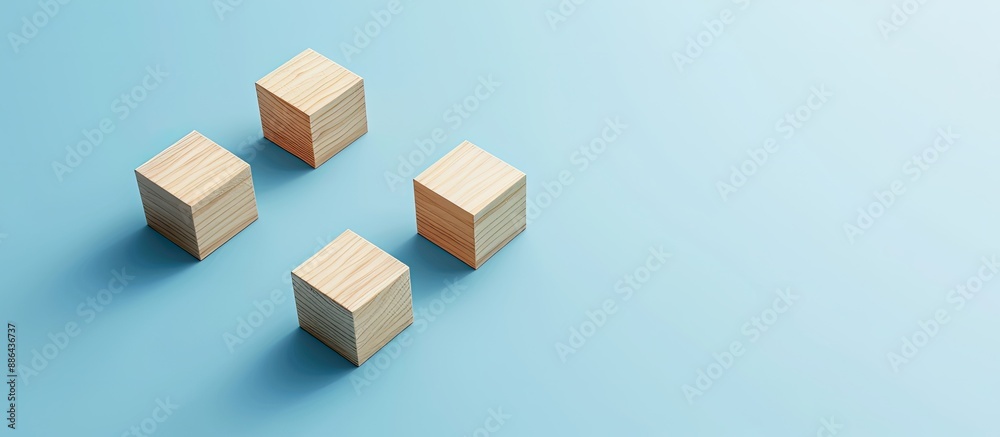 Poster A bird s eye view of three empty wooden cubes on a blue backdrop with copy space image