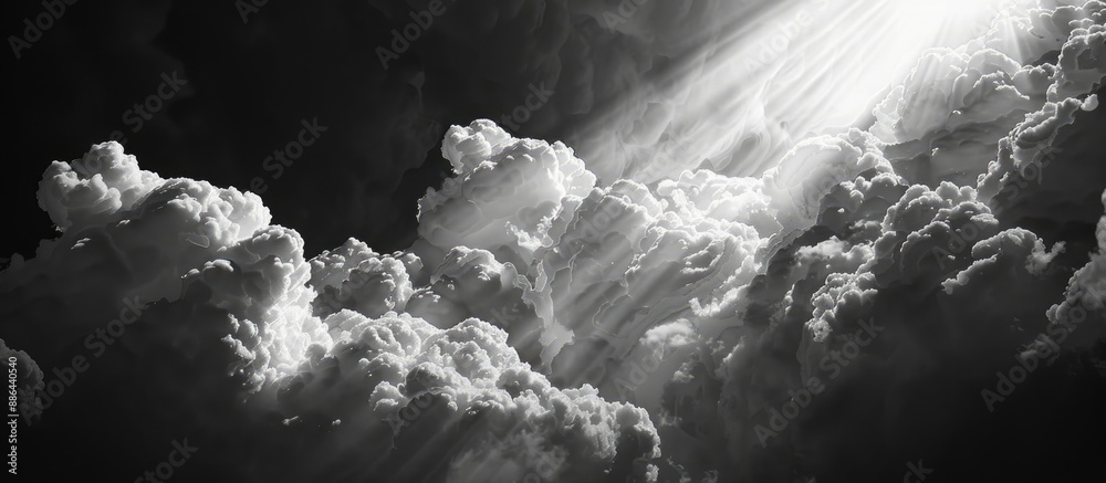 Aufkleber monochrome texture split into black sky and sunlit clouds providing copy space image
