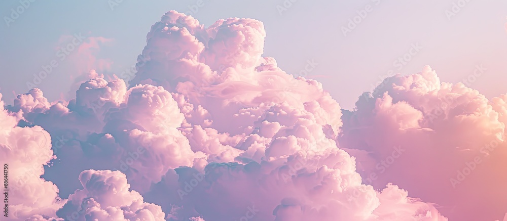 Aufkleber Soft pink clouds float in a softly violet sky providing ample copy space image