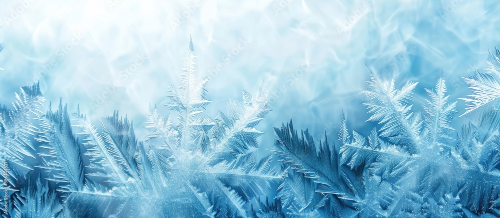 Poster copy space image of frost patterns on a frozen window symbolizing the wonder of the christmas season