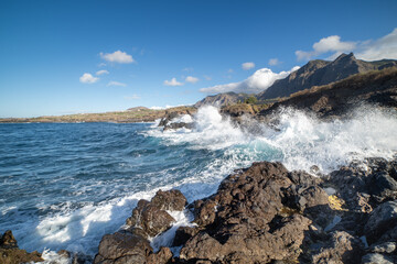 Obraz premium Waves beating against the rocks on the coast of Buenavista del Norte. Tenerife. Canary Islands. Spain